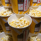 Pyramid stack of movie theater popcorn buckets on display